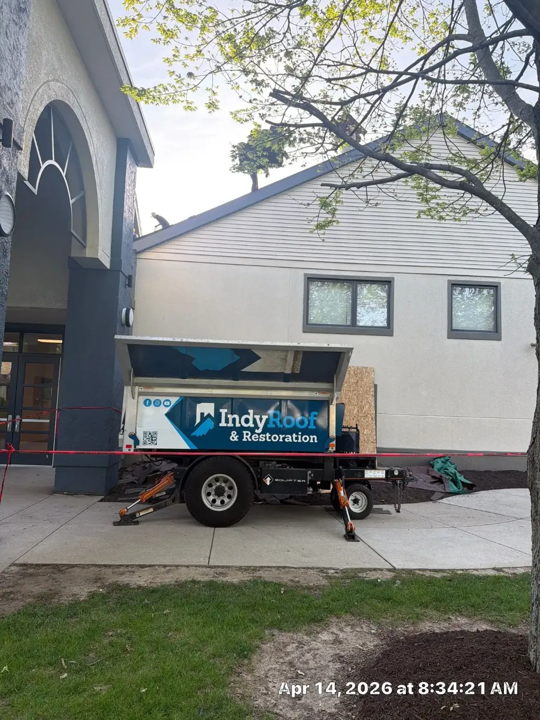 Tarping and dry-in on a Michigantown commercial roof